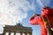 Tourist photographing Brandenburg gate, Berlin