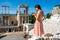 Tourist photographing Roman theater in Plovdiv