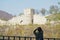 A tourist photographs the fortress of Trapezitsa in Veliko Tarnovo