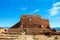 A tourist photographs the historic mission church in Pecos National Historical Park in northern New Mexico