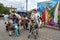 A tourist poses on a wooden horse in the town of Quinche in Ecuador.