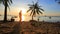 Tourist relaxing on sea beach against beautiful sunset sky