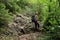 Tourist on rock path in Slovak Paradise