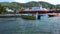 A tourist in a rocking water taxi on bequia