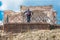 Tourist in Rome, observing a Roman ruin. Imperial Forums.