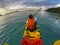 Tourist sailing sea kayak in beautiful blue water of tropical island