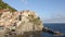 Tourist ship is approaching the small town of Manarola in the Ligurian province of La Spezia.