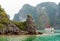 Tourist ship in the bay among the rocks in Halong bay, Vietnam.