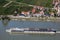 Tourist ship on Danube river against Durnstein village in Wachau valley, Unesco world heritage site in Lower Austria, Austria