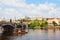 Tourist the ship floats under Charles bridge