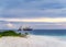 A tourist ship near an uninhabited tropical island in the Indian ocean