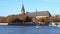 Tourist ship passes on the river.  Kaliningrad Cathedral.