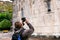 Tourist shooting landmark by smartphone