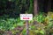 Tourist sign with a red arrow on the white field giving direction to a viewpoint. TRANSLATION: Miradouro - viewpoint in Portuguese