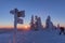 Tourist signpost mountain top Luzny covered by large ice. View of the snowy mountain peaks, view from Lusen in Bavaria in the morn