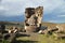 Tourist at the Silustani tombs in the peruvian Andes at Puno Peru