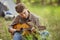 Tourist sitting in the tent, play the guitar and sing songs