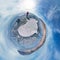 Tourist with sleds walks along the blue ice of Lake Baikal. Spherical 360 panorama little planet