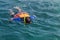 Tourist snorkeling with life jackets in andaman sea