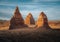 Tourist standing at Temple of the Moon at sunset, Cathedral Valley, Capitol Reef National Park, Utah, Western United