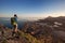 Tourist in Svolvaer taking photo of Lofoten, hiking in Norway