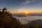 Tourist take photo of Landscape of the mountain and sea of mist in winter sunset / sunrise view from top of Doi Pha Tang mountain