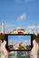 Tourist taking photo of Haghia Sophia