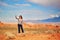 Tourist taking photo with her mobile phone in Valley of the Fire