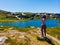 Tourist taking photo in norwegian nature