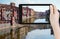 Tourist taking photo of river in Girona town