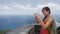 Tourist taking photo of view on St. Kitts - Caribbean cruise destination