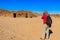 Tourist taking a photos in bedouin village in Arabian desert  Egypt