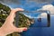 Tourist taking a picture of an amazing landscape on Amalfi Coast, Italy