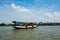 Tourist taxi boat on the Chao Phraya River in Bangkok, Thailan