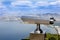 Tourist telescope with scenic view of the sea and blue skies