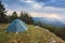 Tourist tent in the camping at the top of the mountain at dawn