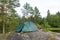 Tourist tent in the rocks of imall island in Ladoga lake, Karelia