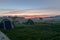 Tourist tents in the field. Tourist camp in the fog. Morning fog at sunrise