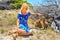 Tourist with three Quokka