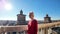 Tourist on top of Ferrara Castle in Italy