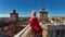 Tourist on top of Ferrara Castle in Italy