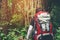 Tourist trail hiking in the forest traveler man with backpack cr