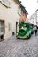 Tourist Train driving through  traditional french houses Petite Venise, Colmar, France.