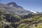 Tourist train running through a mountain gorge in the Pyrenees, Artouste France