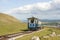 Tourist tram approaching the summit of the Great Orme Llandudno.