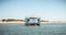 Tourist transport boats moored in the lagoons of the Ria Formosa Natural Park near the port of Tavira, portugal