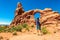 Tourist traveler at Arches National Park in Utah, USA