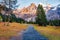 Tourist treck to Oeschinensee Lake. Colorful morning scene of Swiss Alps with Bluemlisalp mountain on background. Splendid autumn