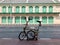 The tourist using Brompton Foldable Bicycle to enjoy Bangkok City View.