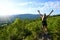 Tourist on the viewpoint under the top of Pancir mountain. National Park Sumava, Czech republic.